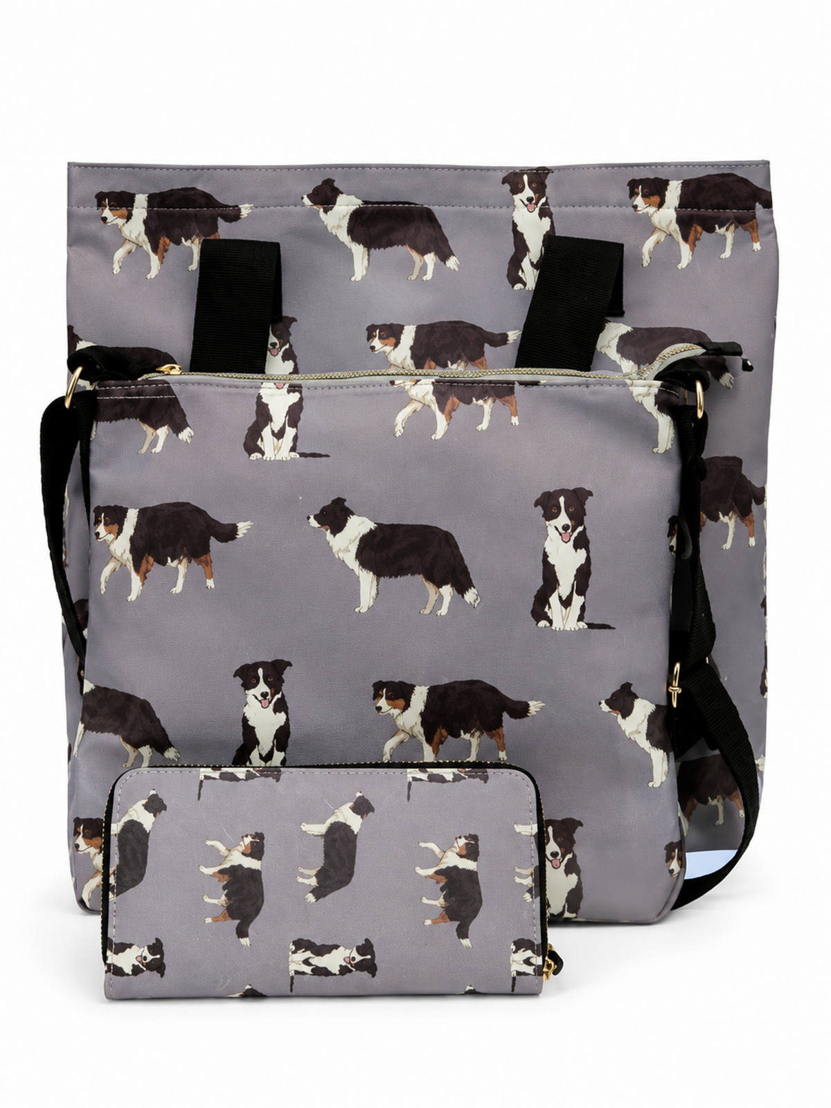 A grey crossbody bag with a black and white Border Collie dog print, shown with a matching zippered pouch. The bag features black handles and a black shoulder strap, photographed on a clean white background.