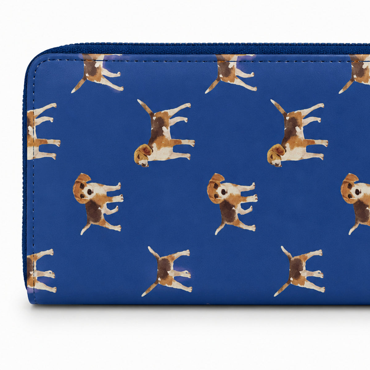A blue zip-around wallet with a repeating watercolour print of small brown and cream Beagle dogs, shown against a plain white background.