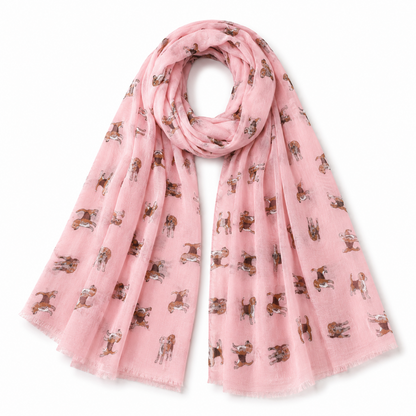 A light pink scarf with a repeating print of Beagle dog illustrations, styled in a loop on a plain white background.