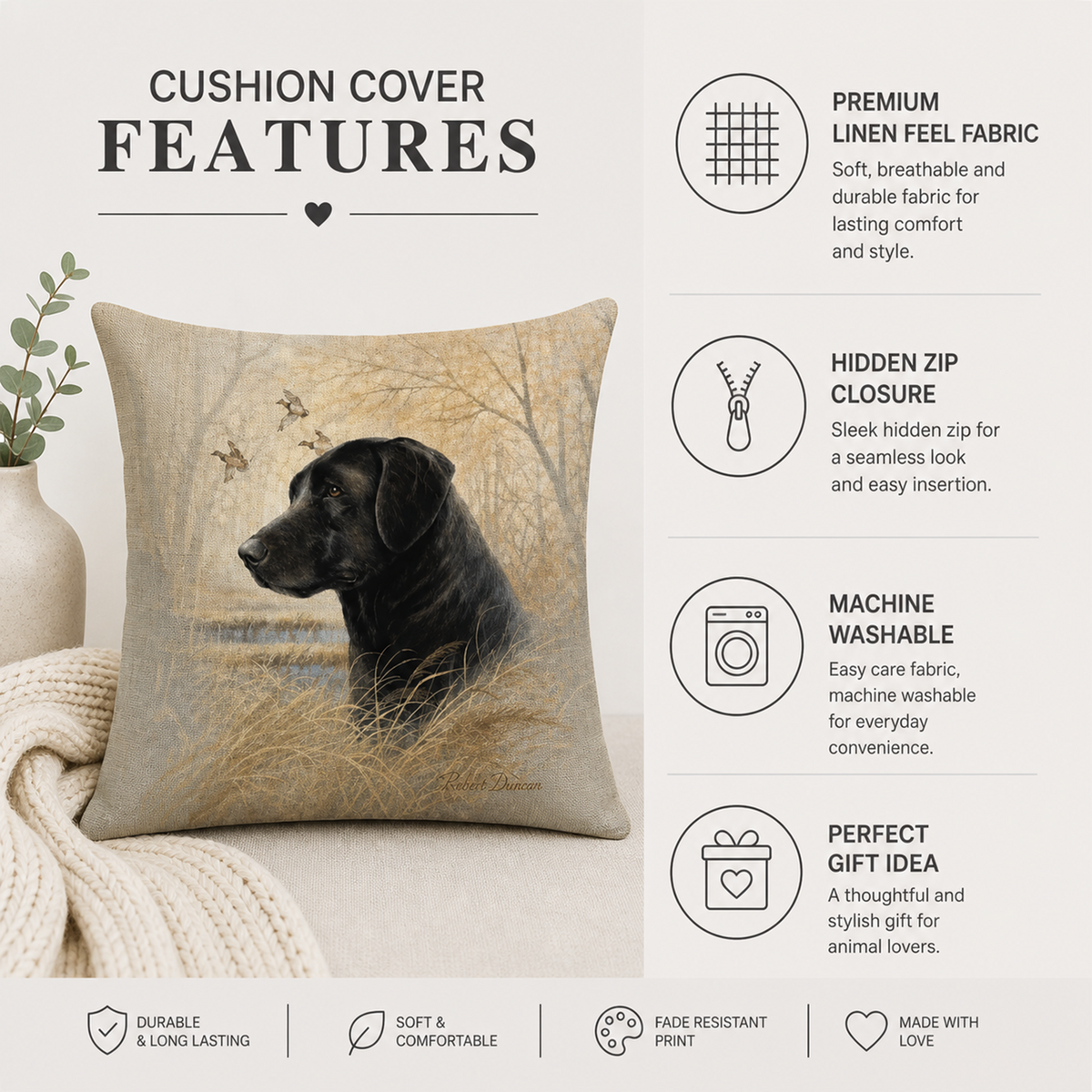 A square cushion cover featuring a black Labrador dog lying in tall beige grass, shown on a sofa with a blanket and a vase. The image includes feature callouts for premium linen fabric, hidden zip closure, machine washability, and gift-ready presentation.