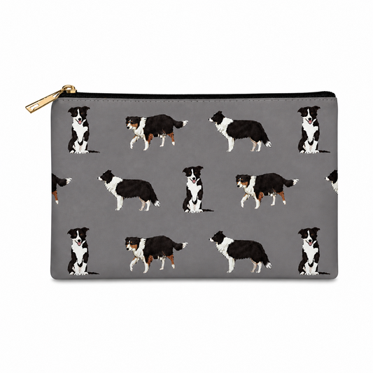 A grey zipped cosmetic bag featuring a repeating pattern of black and white Border Collie dogs, with a gold zipper pull.