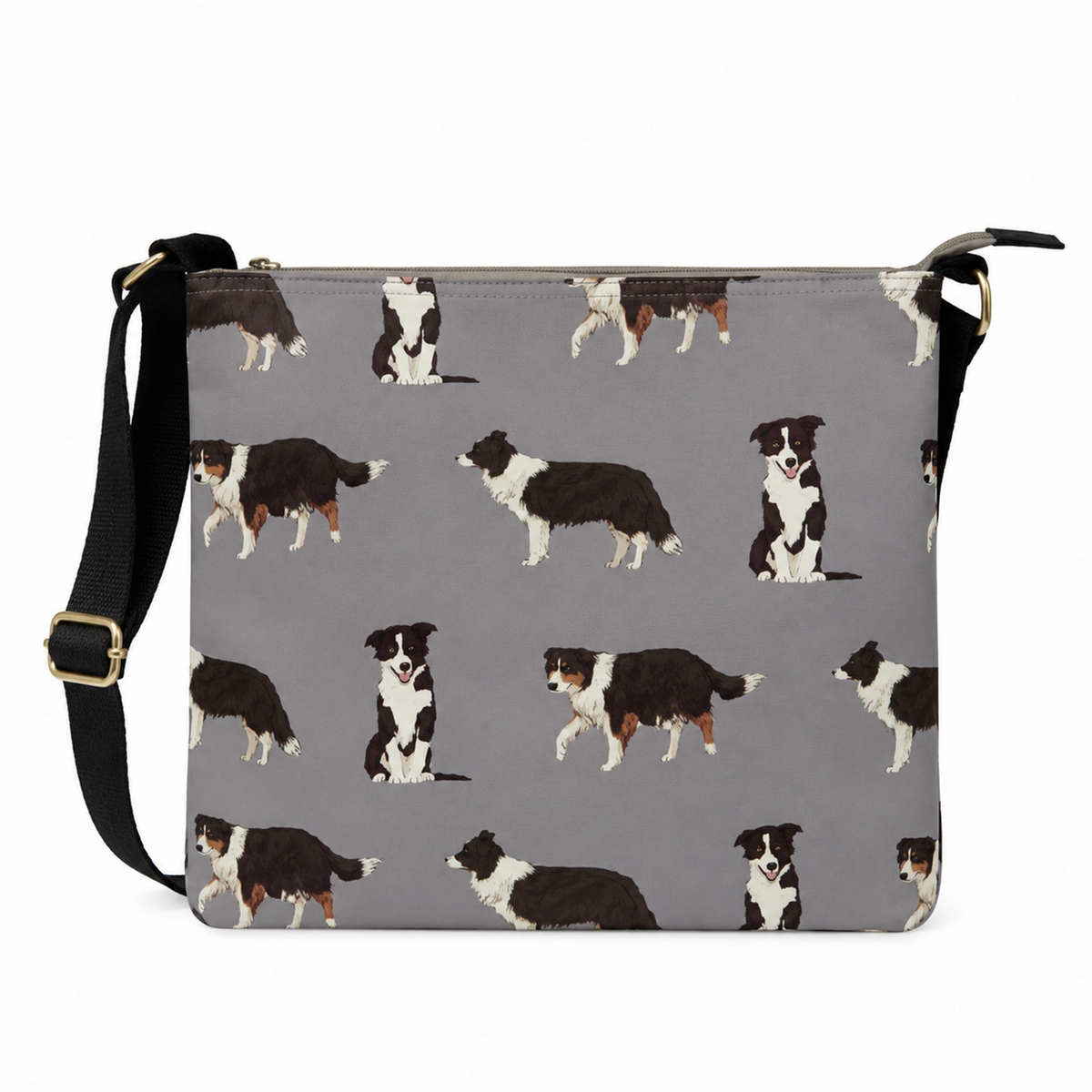 A grey crossbody bag featuring a repeating pattern of black and white Border Collie dogs, with a black adjustable shoulder strap and gold-tone hardware.