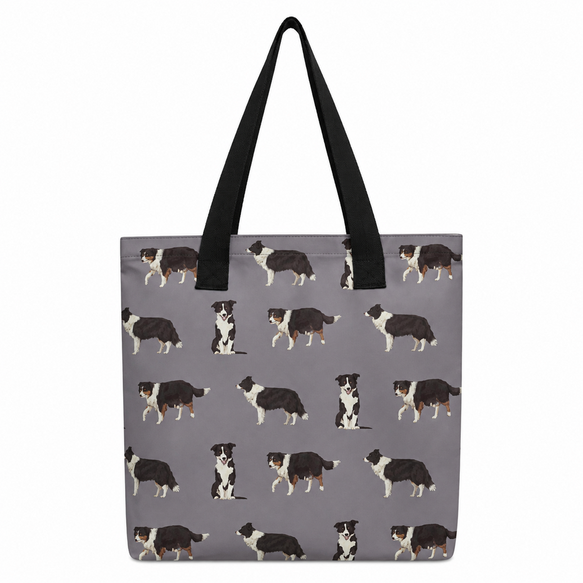 A grey tote bag with black shoulder straps, featuring an all-over repeating pattern of black, white, and tan dog illustrations, shown against a plain white background.