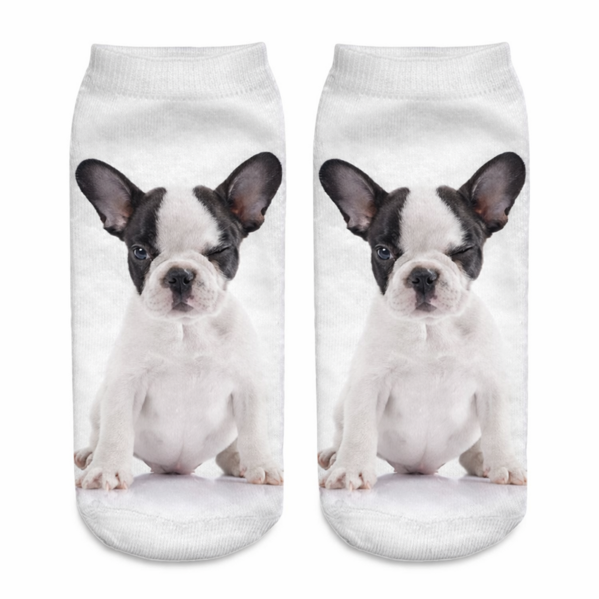 A pair of white ankle socks featuring a printed photo of a black and white Boston Terrier puppy dog on each sock, shown against a plain white background.
