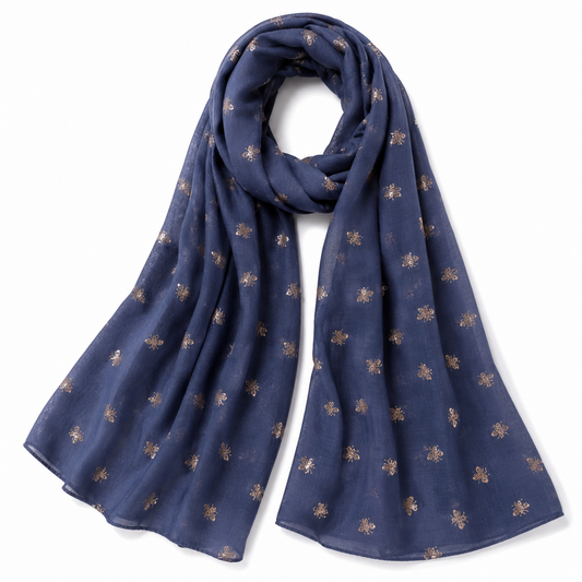 Denim blue scarf with small rose gold bee patterns on a denim background