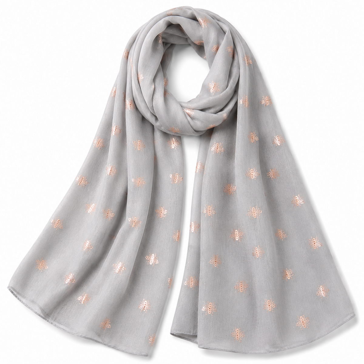 A light grey scarf with small rose gold embroidered bumblebee motifs, draped in a loop on a white background.