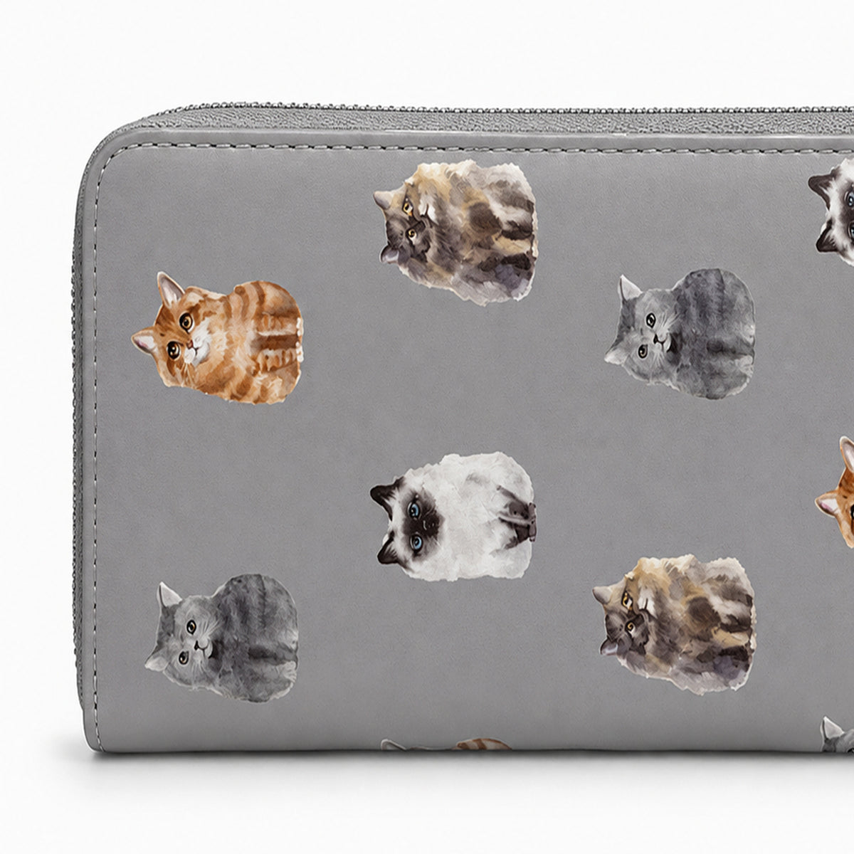 A grey zip-around wallet featuring a repeating watercolor print of various cat faces in orange, grey, white, and brown, shown against a plain white background.
