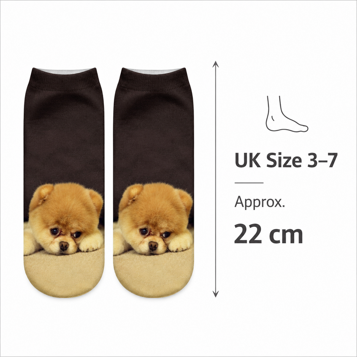 A pair of low-cut socks with a printed design of a fluffy cream-colored Chow Chow puppy on the lower half, shown on a white background with size information indicating UK Size 3-7 and 22 cm length.