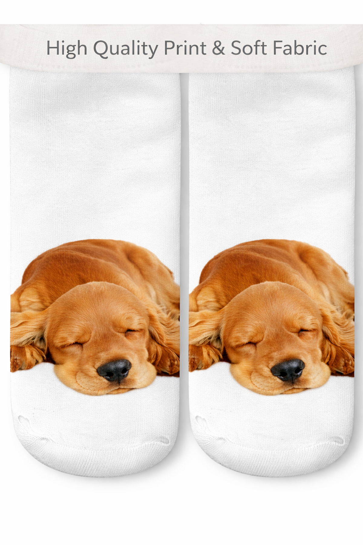 A pair of white crew socks with a printed image of a sleeping Cocker Spaniel dog on the front, shown against a white background with a banner at the top reading 'High Quality Print & Soft Fabric'.
