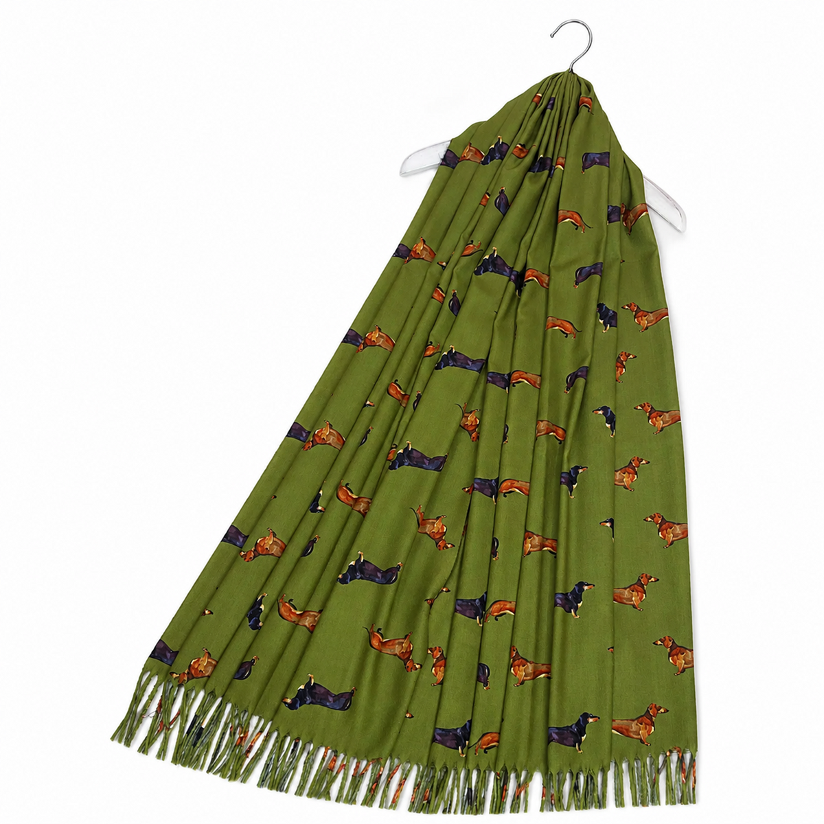 An olive green scarf with a dachshund dog pattern, hanging from a white hanger against a plain white background.