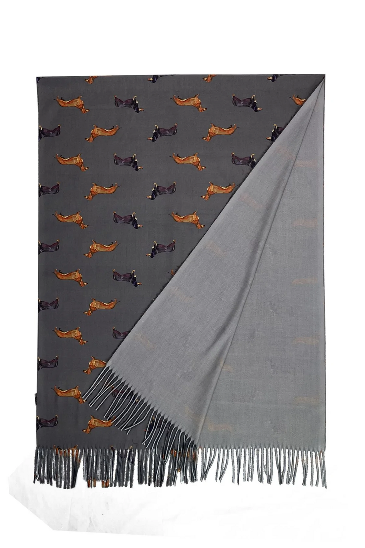 A folded grey scarf with fringe, featuring a patterned side with small tan and black dachshund sausage dog and a solid light grey reverse side.