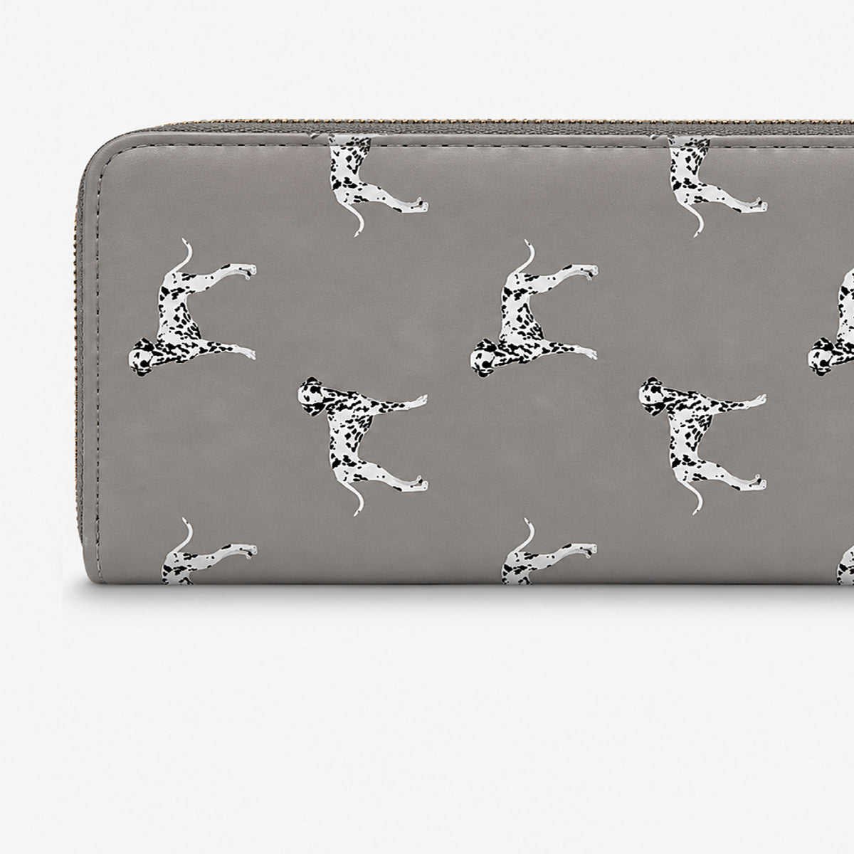 A grey zip-around wallet featuring a repeating pattern of Dalmatian dogs in black and white, shown against a plain light grey background.