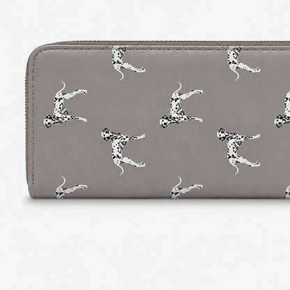 A grey zip-around wallet featuring a repeating pattern of Dalmatian dogs in black and white, shown against a plain light grey background.