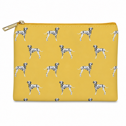 A mustard zippered cosmetic bag featuring an all-over print of Dalmatian dogs, with a gold zipper and pull tab, shown on a plain white background.