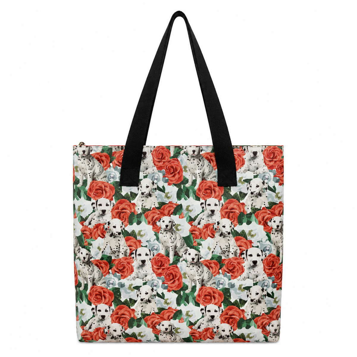 A tote bag featuring an all-over pattern of Dalmatian dogs and red roses on a white background, with black shoulder straps.