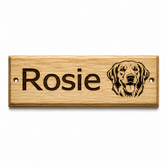 A personalised wooden kennel door sign with the name 'Rosie' in engraved black lettering and a black line-art portrait of a golden retriever dog, shown on a clean white background.