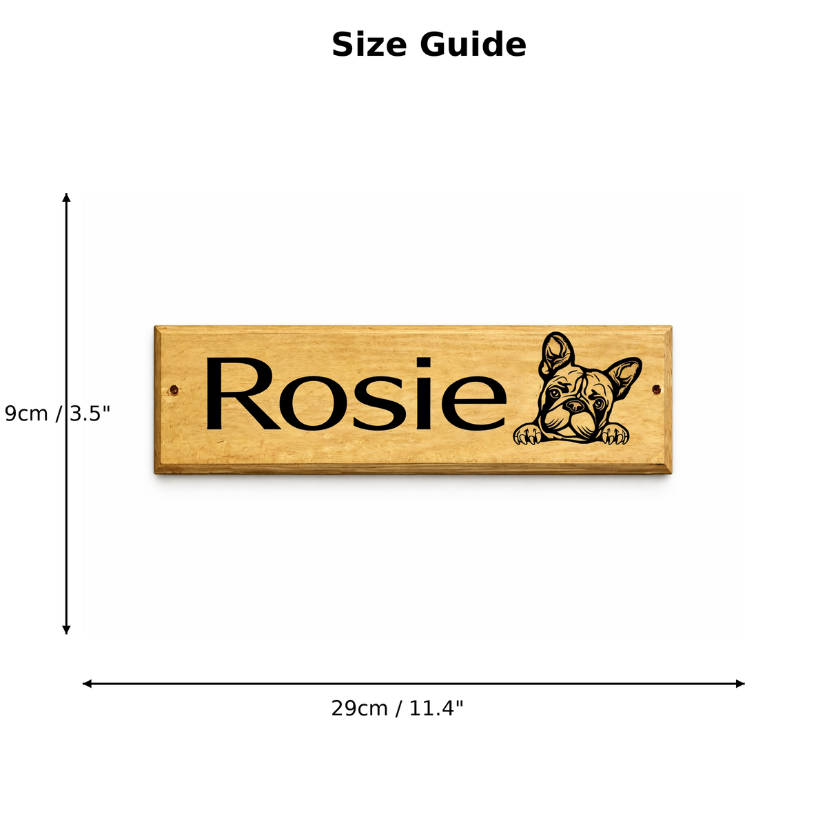 A size guide diagram showing a rectangular wooden kennel door sign with the name 'Rosie' and a French bulldog illustration. Black dimension arrows indicate the sign is 9cm by 29cm (3.