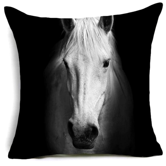 Decorative cushion cover with a black and white horse design on a plain background