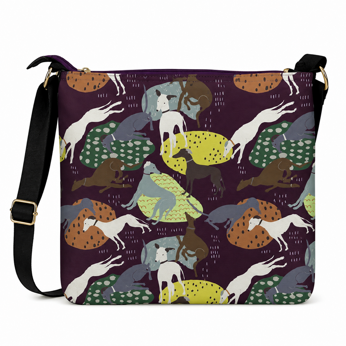 A square crossbody bag with a dark purple background and an all-over whimsical pattern of Greyhound dogs in white, brown, grey, green, and yellow. The bag has a black shoulder strap with gold-tone hardware.