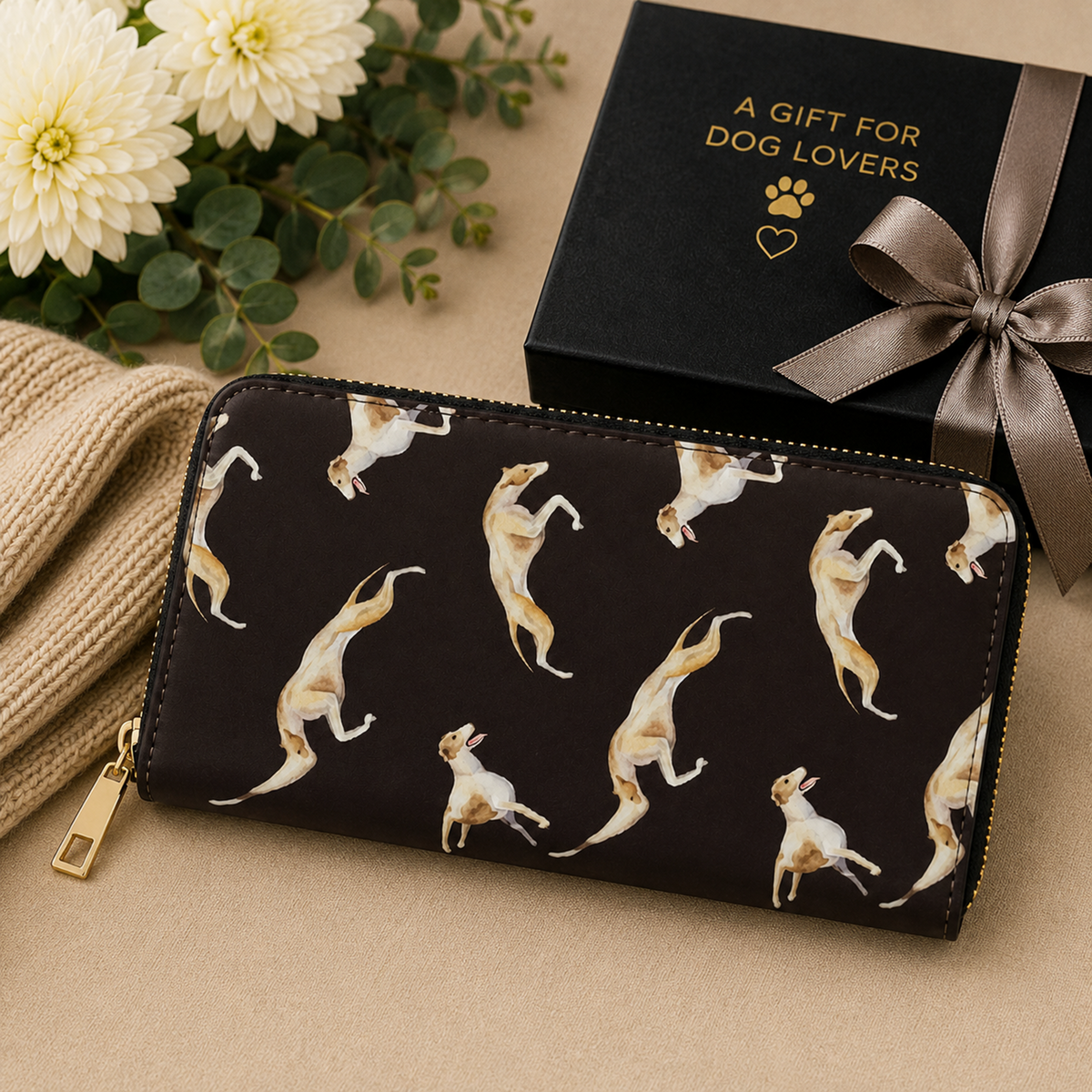 A dark brown zip-around wallet with a repeating pattern of light brown and white Greyhound & Whippet dogs in various playful poses, featuring a gold-tone zipper pull.