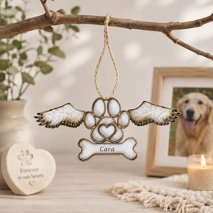 Personalised pet memorial decoration displayed in a warm remembrance setting