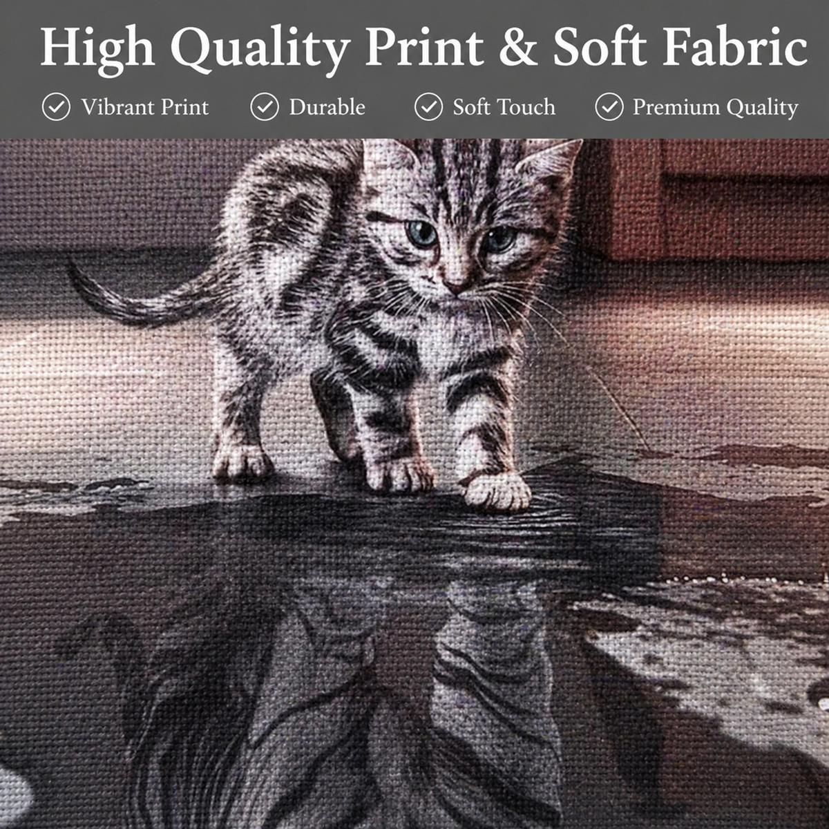 Close-up of a woven fabric print featuring a tabby kitten standing on a wet reflective surface, with a dark banner at the top reading 'High Quality Print & Soft Fabric' and feature callouts.