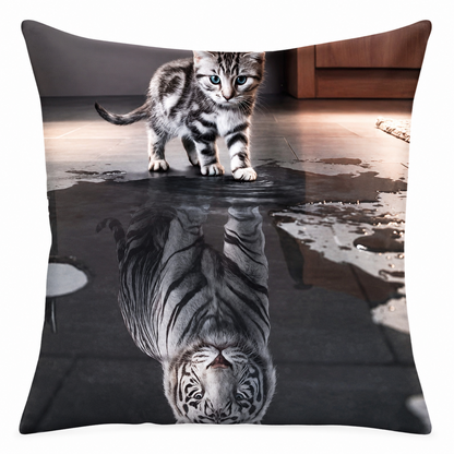 Square cushion cover featuring a small grey tabby kitten standing on a dark floor with its reflection mirrored in a puddle, shown against a plain white background.