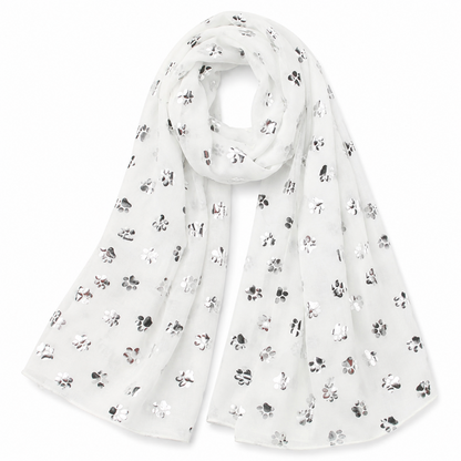 A white sheer scarf with a scattered metallic silver paw print pattern, draped in a loop on a clean white background.