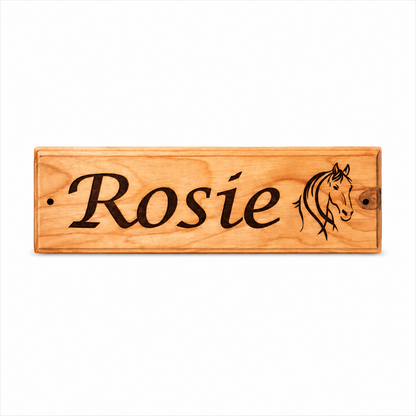 A personalised wooden stable door sign featuring the name 'Rosie' in black script and a black horse head engraving, set against a clean white background.