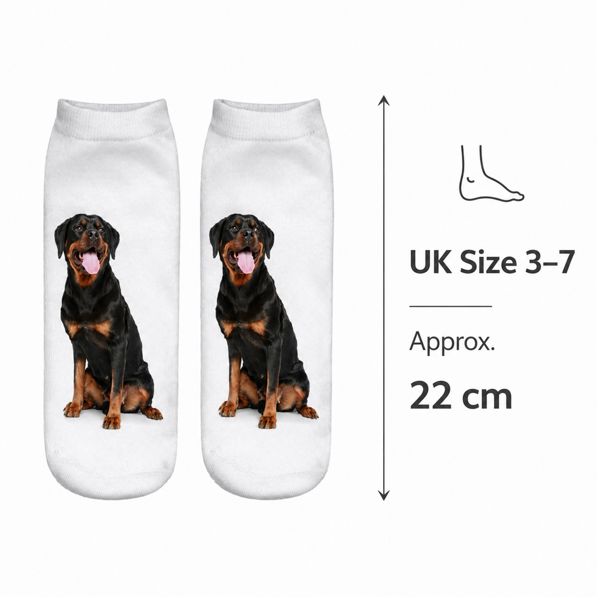 A pair of white ankle socks printed with a black and tan Rottweiler dog, shown on a white background with a size callout indicating UK size 3-7 and 22 cm length.