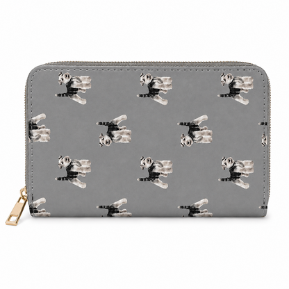 A grey zip-around wallet with a repeating print of black and white Schnauzer dogs in various poses, shown on a plain white background.