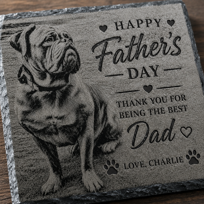 Personalised engraved slate Father's Day gift plaque featuring a detailed bulldog portrait and the text 'HAPPY Father's DAY THANK YOU FOR BEING THE BEST Dad LOVE, CHARLIE' on a dark wood surface.