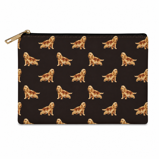 A rectangular zip cosmetic bag with a black background and an all-over repeating print of Cocker Spaniel dogs, shown on a plain white background.