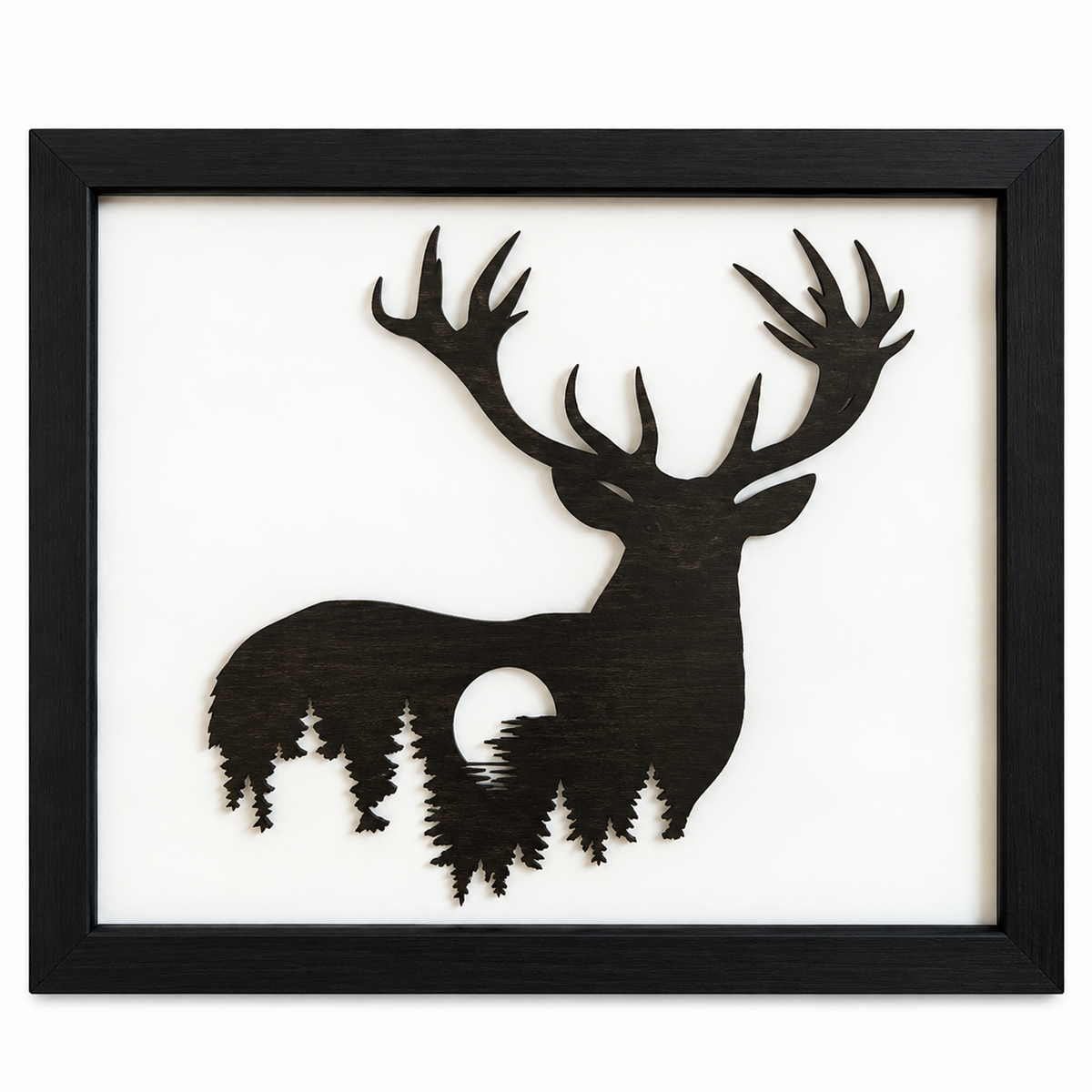 Framed wooden deer silhouette wall art with a dark wood stag cutout on a white background, enclosed in a black frame.