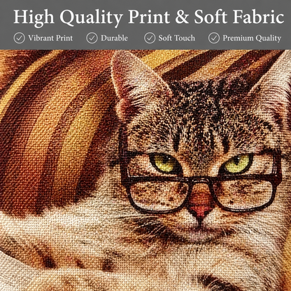 Close-up of a printed cushion cover featuring a tabby cat with green eyes and black glasses, with a dark grey banner at the top reading 'High Quality Print & Soft Fabric' and listing quality features.