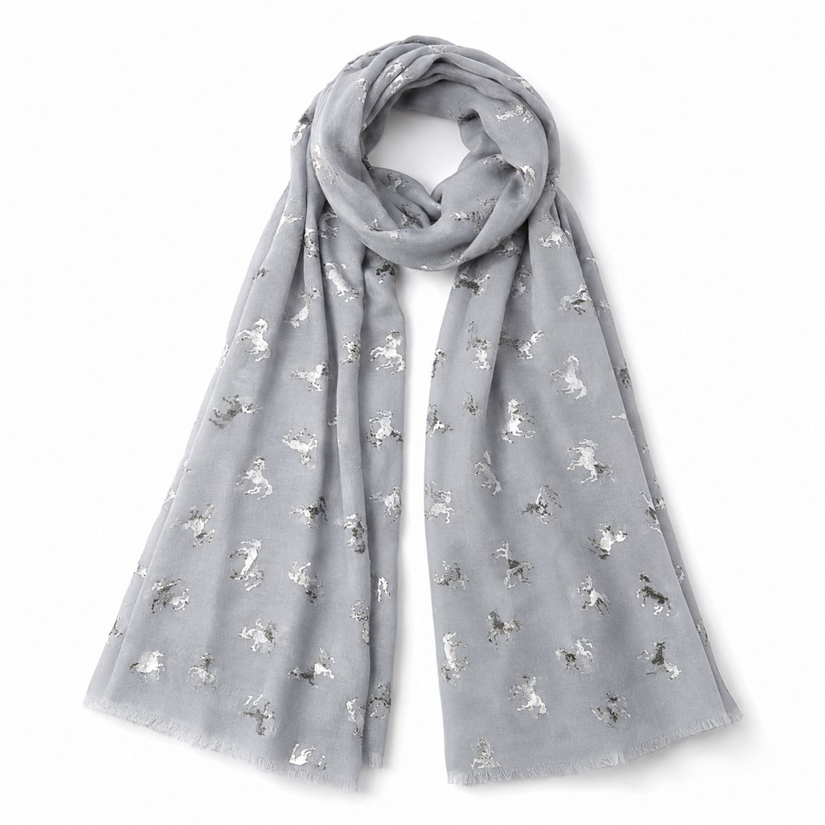 A light grey scarf with a repeating pattern of small metallic silver unicorns, draped in a loop on a white background.
