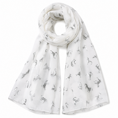 White scarf with silver foil unicorn pattern on a white background