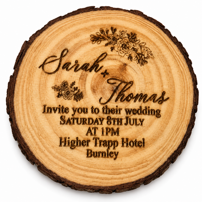 A round wooden wedding sign with a natural tree slice edge, featuring laser-engraved text for Sarah and Thomas's wedding on a white background.