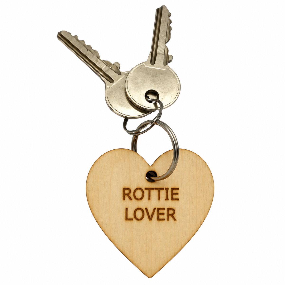 A heart-shaped wooden keychain engraved with 'ROTTIE LOVER' in brown lettering, attached to a metal keyring with two silver keys, shown on a plain white background.