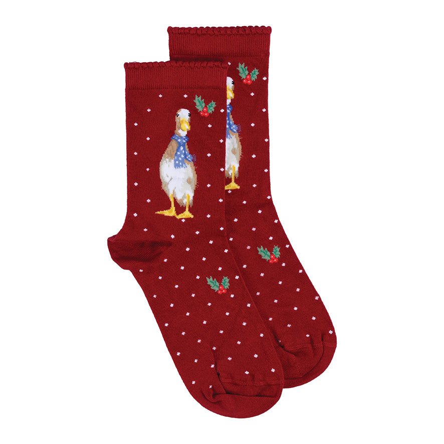 Red socks with a cartoon duck design on a white background