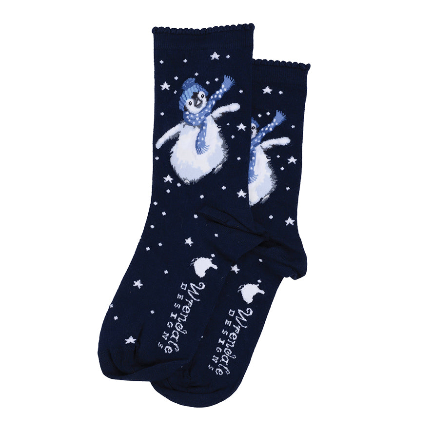 A pair of navy blue crew socks featuring a white and light blue snowman design, white stars, and the text 'Winter is Coming' printed on the soles, displayed against a plain white background.