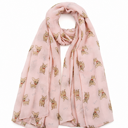 A light pink scarf featuring an all-over print of small tan Chihuahua dogs wearing red collars and white bone motifs, shown draped against a plain white background.
