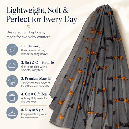 A lightweight grey dog scarf with an all-over print of black and tan dachshund sausage dogs, shown next to a text graphic highlighting its comfort, weight, and suitability as a dog gift.