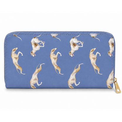 A blue zip-around wallet featuring a repeating pattern of white and tan Greyhound & Whippet dogs in various jumping and stretching poses, shown on a plain white background with a gold zipper pull.