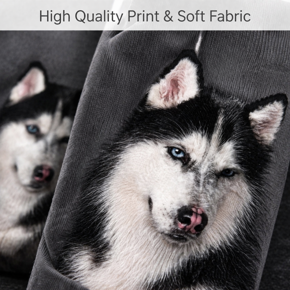 A close-up of a printed sock featuring a husky dog face, draped over a dark grey corduroy surface. A second husky is visible in the background, and a banner at the top reads 'High Quality Print & Soft Fabric'.