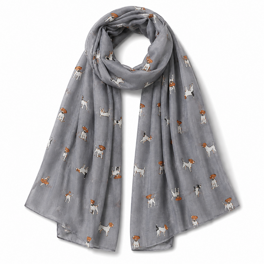 A light grey scarf featuring a repeating pattern of small Jack Russell Terrier dogs in white, brown, and black, shown on a clean white background.
