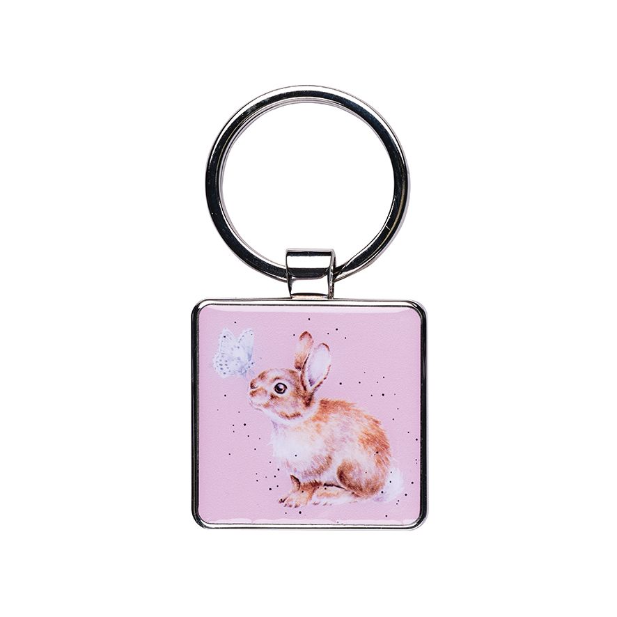 Keychain with a rabbit design on a pink background