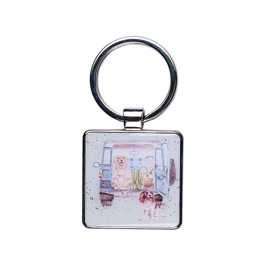Keychain with a design of a dog and a child in a room on a white background