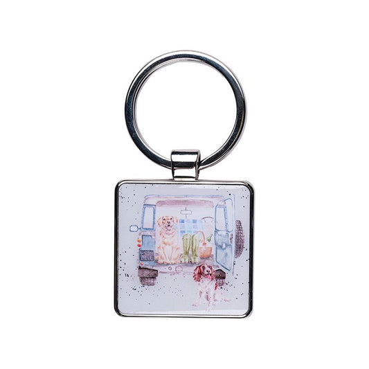 Keychain with a design of a dog and a child in a room on a white background