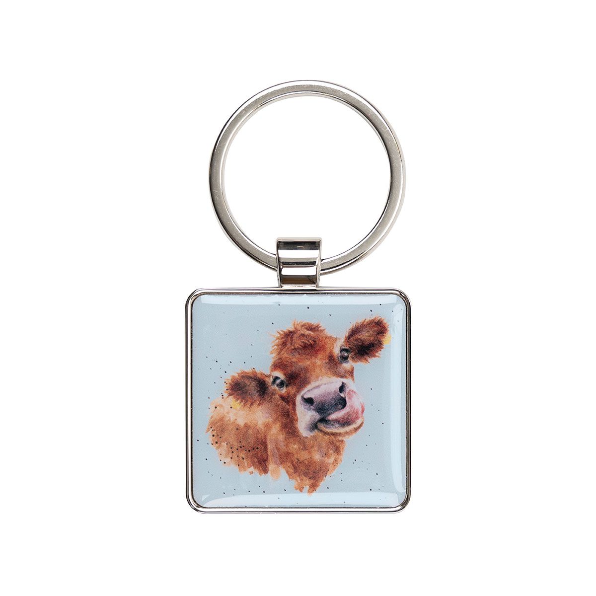 Keychain with a cow illustration on a light blue background